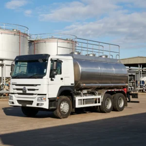 HOWO 20,000 L fuel tanker truck 6x4, white HOWO cab and stainless steel tank, at a fuel depot