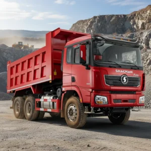 Shacman X3000 6x4 dump truck, 10 wheels, red cab and tipper body, at a stone quarry
