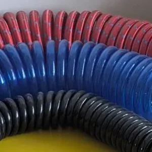 Red and blue trailer air brake coils with spring guards and brass fittings